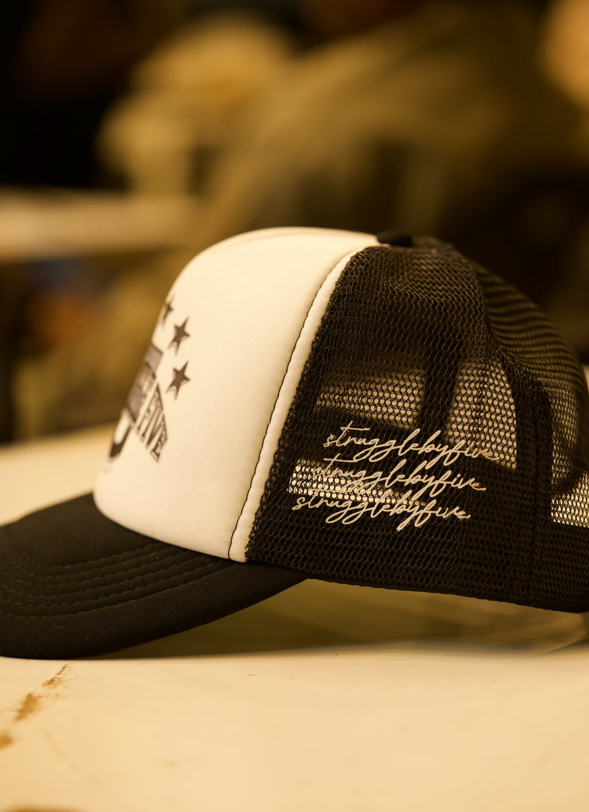 Black Rated 5 Stars Trucker Hat